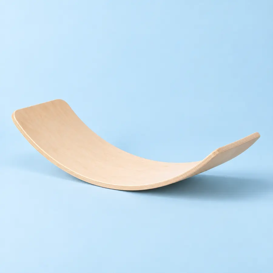 Curved wooden balance board